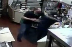 Clerk fights gunman, via screengrab