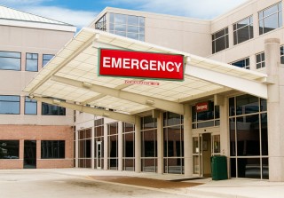 Image of hospital via Shutterstock
