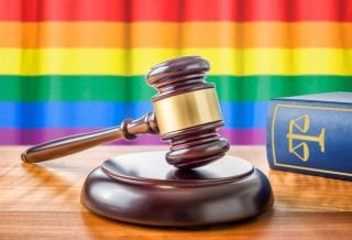 Image of gavel and rainbow flag via Shutterstock