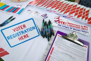 Image of voter registration forms via Joseph Sohm/Shutterstock