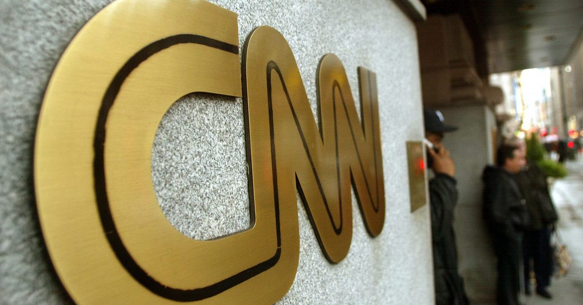 NEW YORK - NOVEMBER 12: The CNN sign is seen outside its headquarters November 12, 2002 in New York City. The proposed merger between CNN and Walt Disney Co.'s ABC News is progressing and could reach an agreement on principle by January, according to negotiators close to the deal. (Photo by Mario Tama/Getty Images)