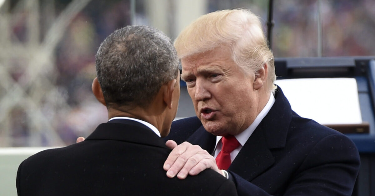 WASHINGTON, DC - JANUARY 20: US President Donald Trump speaks with former President Barack Obama during the Presidential Inauguration at the US Capitol on January 20, 2017 in Washington, DC. Donald J. Trump became the 45th president of the United States today.