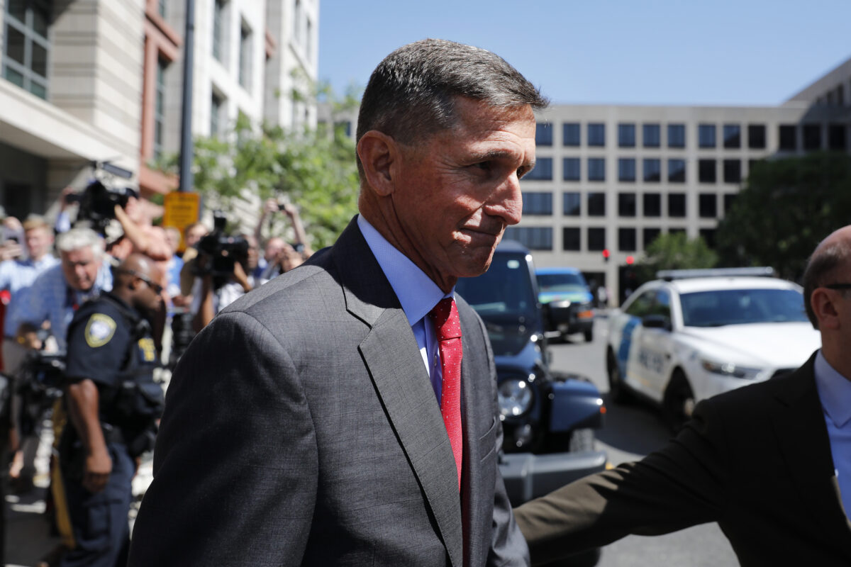 WASHINGTON, DC - July 10: Michael Flynn, former National Security Advisor to President Donald Trump, departs the E. Barrett Prettyman United States Courthouse following a pre-sentencing hearing July 10, 2018 in Washington, DC. Flynn has been charged with a single count of making a false statement to the FBI by Special Counsel Robert Mueller.