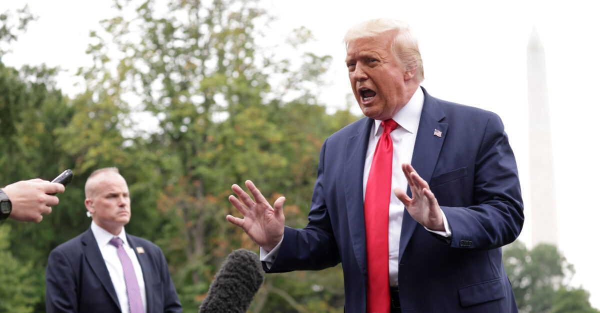 WASHINGTON, DC - JULY 31: U.S. President Donald Trump speaks to members of the press prior to a Marine One departure from the South Lawn of the White House July 31, 2020 in Washington, DC. President Trump is travelling to Florida to attend campaign events and a COVID-19 response and storm preparedness roundtable. (Photo by Alex Wong/Getty Images)