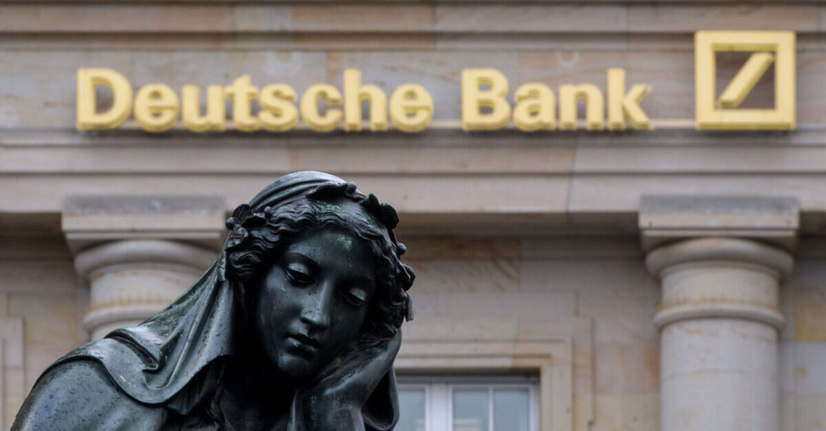 FRANKFURT AM MAIN, GERMANY - FEBRUARY 01: A branch of the German bank Deutsche Bank pictured with a sculpture of the 