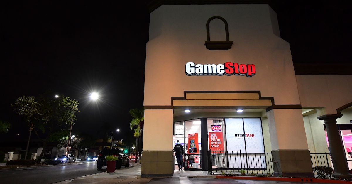 A man steps out of a GameStop store in Alhambra, California on January 27, 2021. - An epic battle is unfolding on Wall Street, with a cast of characters clashing over the fate of GameStop, a struggling chain of video game retail stores. Traders have been astounded in recent days by the surge in struggling video game retailer GameStop's share price, after a group of amateur investors banded together over the online platform Reddit to fight the Wall Street funds that had pushed its price lower. (Photo by Frederic J. BROWN / AFP) (Photo by FREDERIC J. BROWN/AFP via Getty Images)