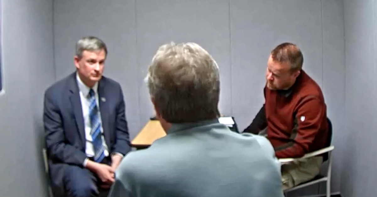 A still frame shows Jason Ravnsborg's interrogation video.