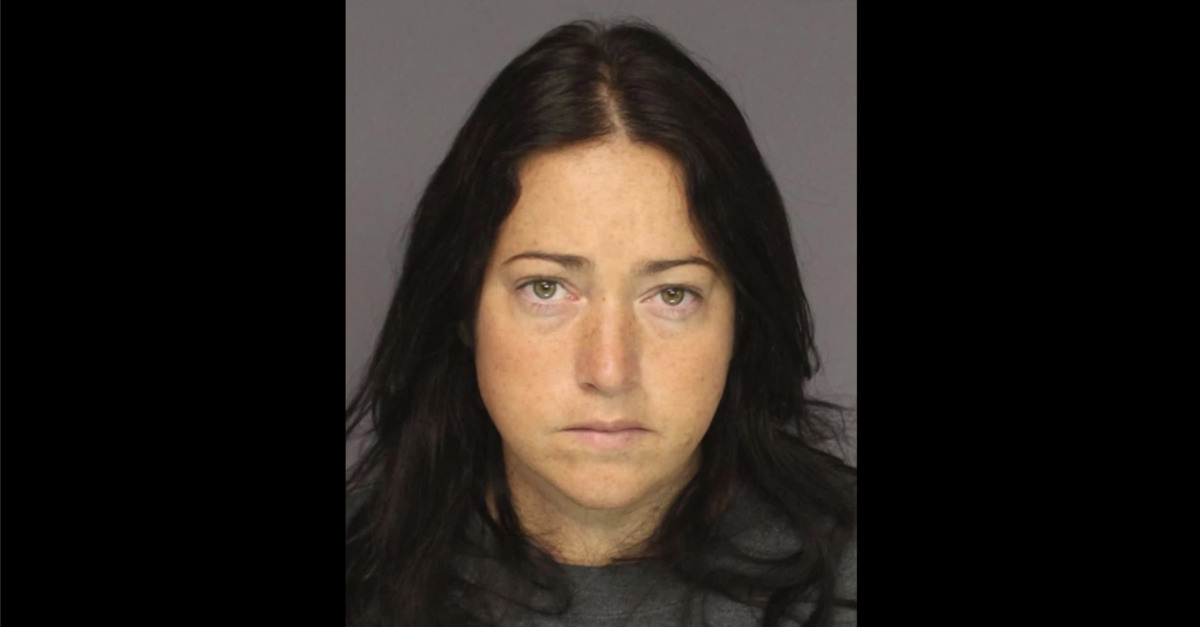 Nicole Dufault appears in a mugshot
