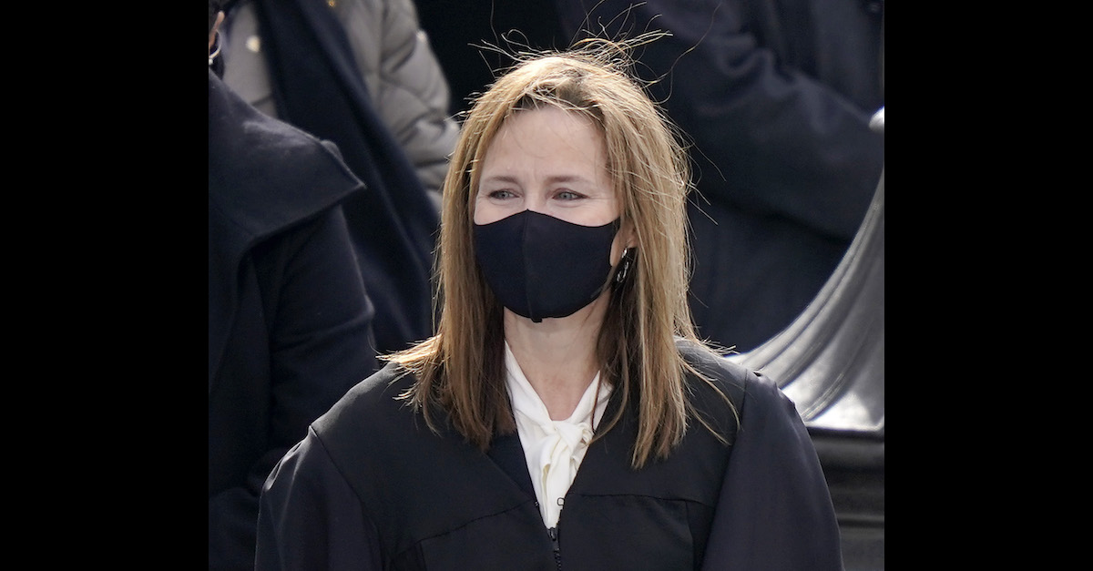 U.S. Supreme Court Justice Amy Coney Barrett is seen wearing a mask in a Jan. 2020 file photo in Washington, D.C.