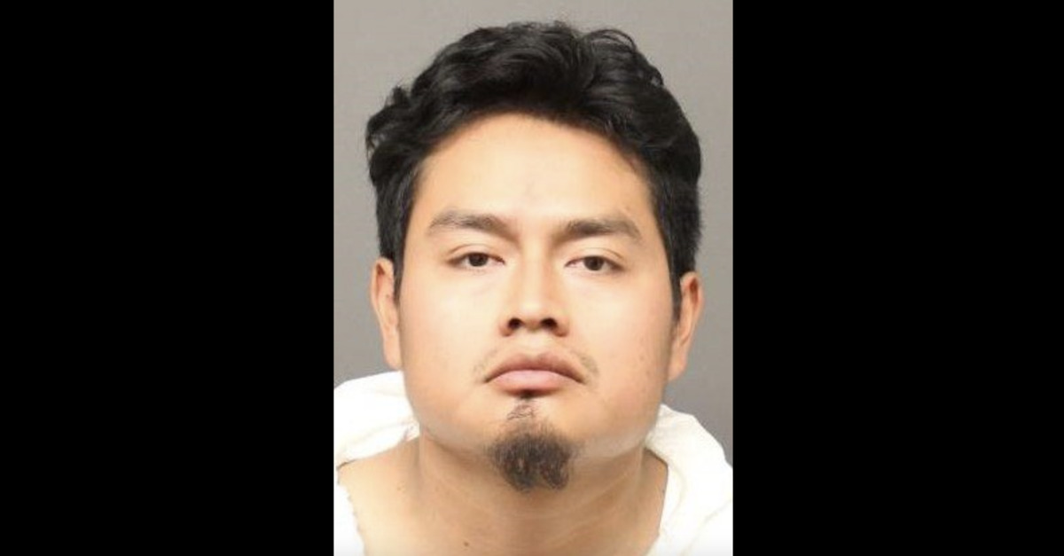 Christian V. Giron appears in a mugshot