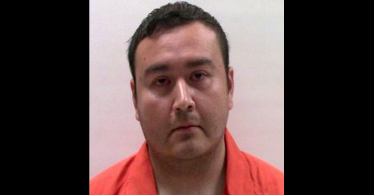 Former Primera, Tex. Police Department police officer Joel Alex Sandate appears in a jail mugshot.
