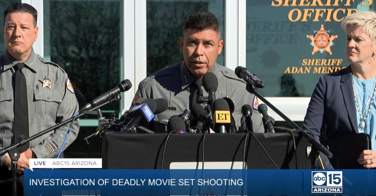 Santa Fe County Sheriff Adan Mendoza (center) appears with District Attorney Mary Carmack-Altwies (right) at a news conference on Oct. 27, 2021. (Image via screengrab from YouTube/KNXV-TV.)