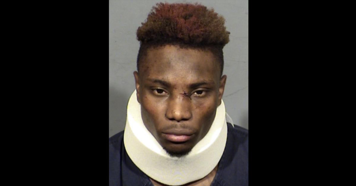 Henry Ruggs III appears in a mugshot