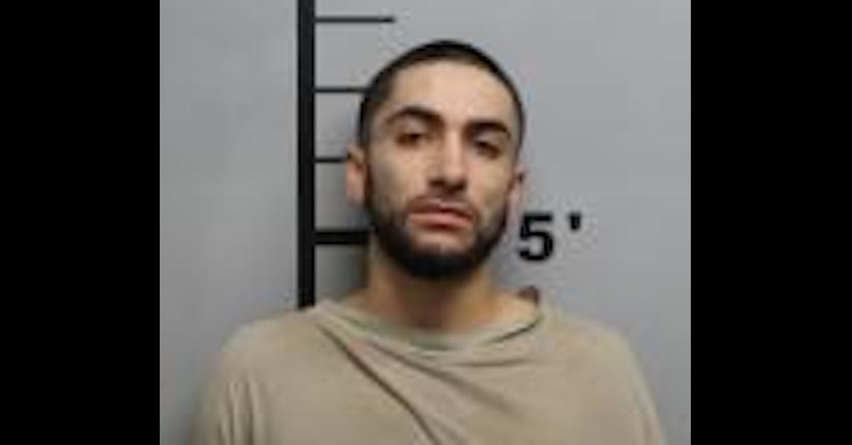 Martin E. Tavarez-Torres appears in a Benton County, Ark. Jail mugshot.