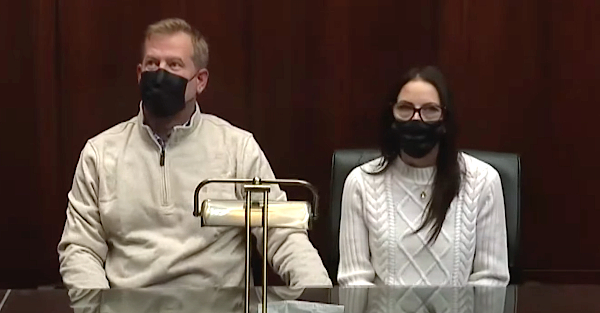 Jeffrey Franz and Brandi Franz appear during a Dec. 9, 2021 news conference to announce a civil lawsuit against the Oxford Community School District. (Image via screengrab from WZZM-TV/YouTube.)