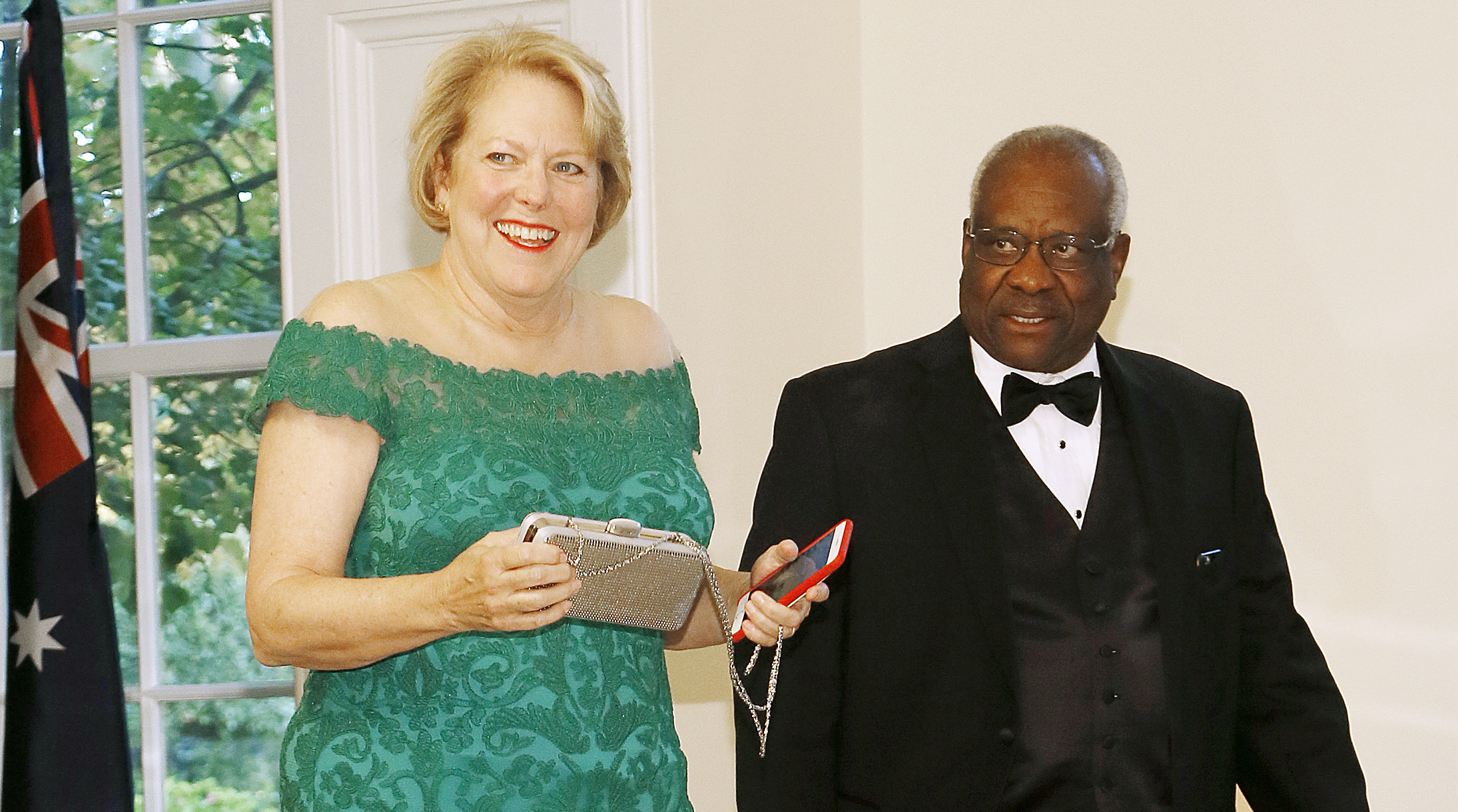 WASHINGTON, DC - SEPTEMBER 20: Supreme Court Justice Clarence Thomas (R) and Virginia Thomas arrive for the State Dinner at The White House honoring Australian PM Morrison on September 20, 2019 in Washington, DC. Prime Minister Morrison is on a state visit in Washington hosted by President Trump. (Photo by Paul Morigi/Getty Images)