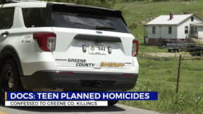 A sheriff's vehicle outside the scene of a double murder in Tennessee