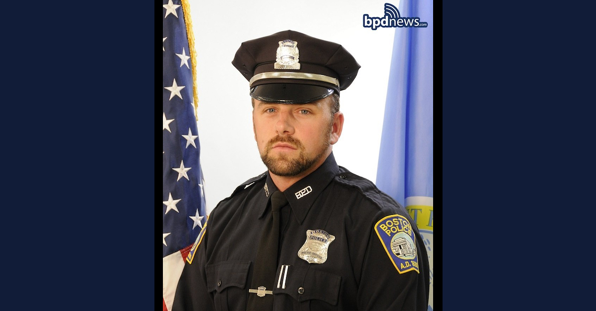 Officer John O'Keefe is seen in an official portrait released by the Boston Police Department.