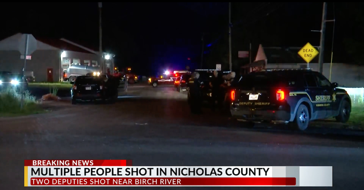 The scene near U.S. 19 in Birch River, Nicholas County, W. Va., after Deputy Tom Baker was fatally wounded nearby. (Screengrab via WOWK-TV.)