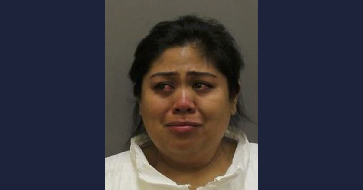 Irene Guzman appears in a mugshot