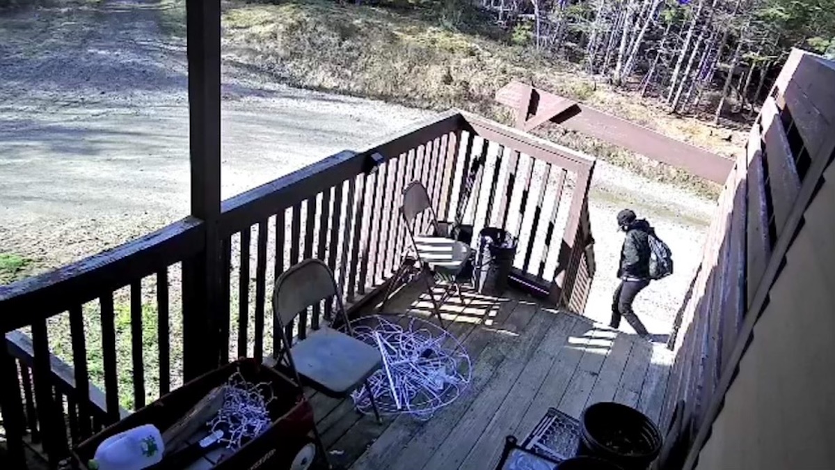 A suspect subsequently identified as Kailie A. Brackett by Maine law enforcement authorities walked past a neighbor's surveillance camera near a murder scene. (Image via the Maine State Police.)