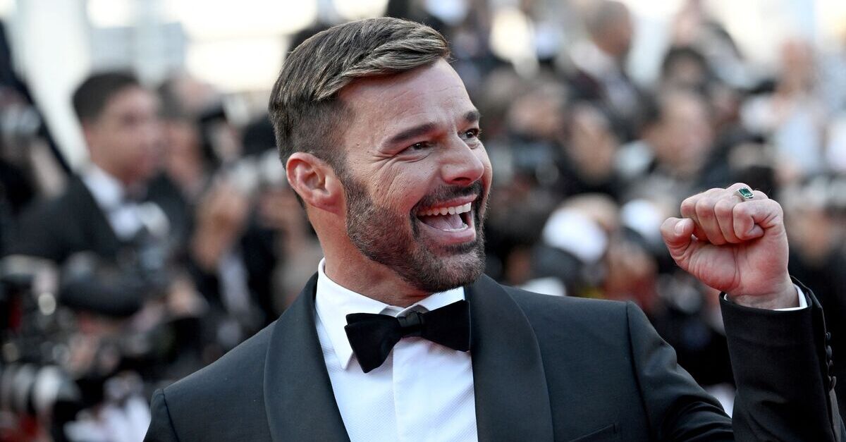 Ricky Martin raises his fist at Cannes