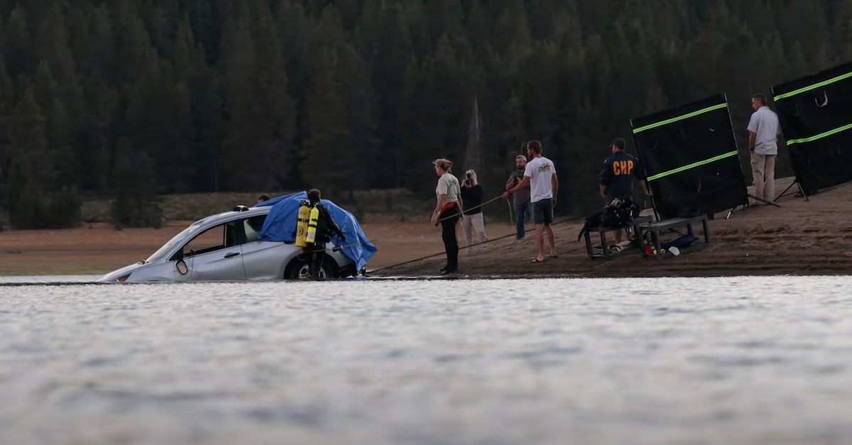 A photo shows the recovery of Keeley Rodney's car from a lake.