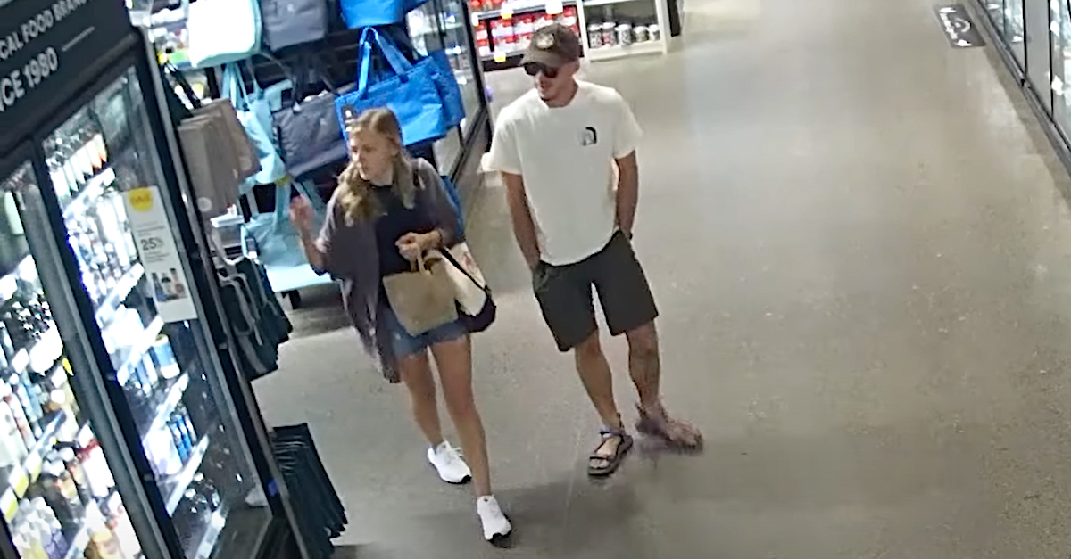 Gabby Petito and Brian Laundrie appear in a surveillance video screengrab.