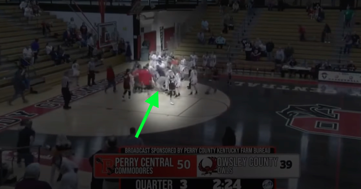 A video screengrab shows a high school basketball game fight.