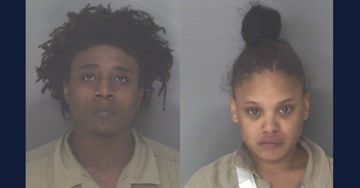 Devante Brothea Porter and Jermecia Tresha Martin were arrested after Porter's three-year-old son allegedly shot himself in the head. (Mugshots: Douglas County Sheriff's Office)