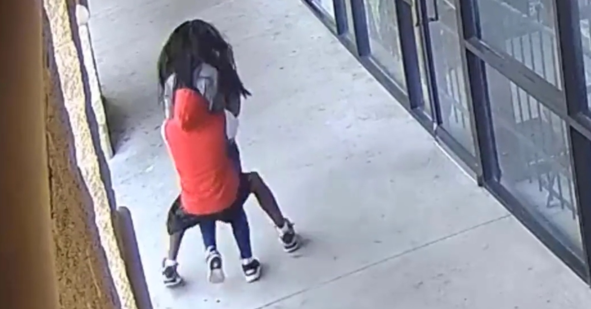 A person body slammed Nhung Truong when robbing her, police said. (Screenshot: Houston Police Department)