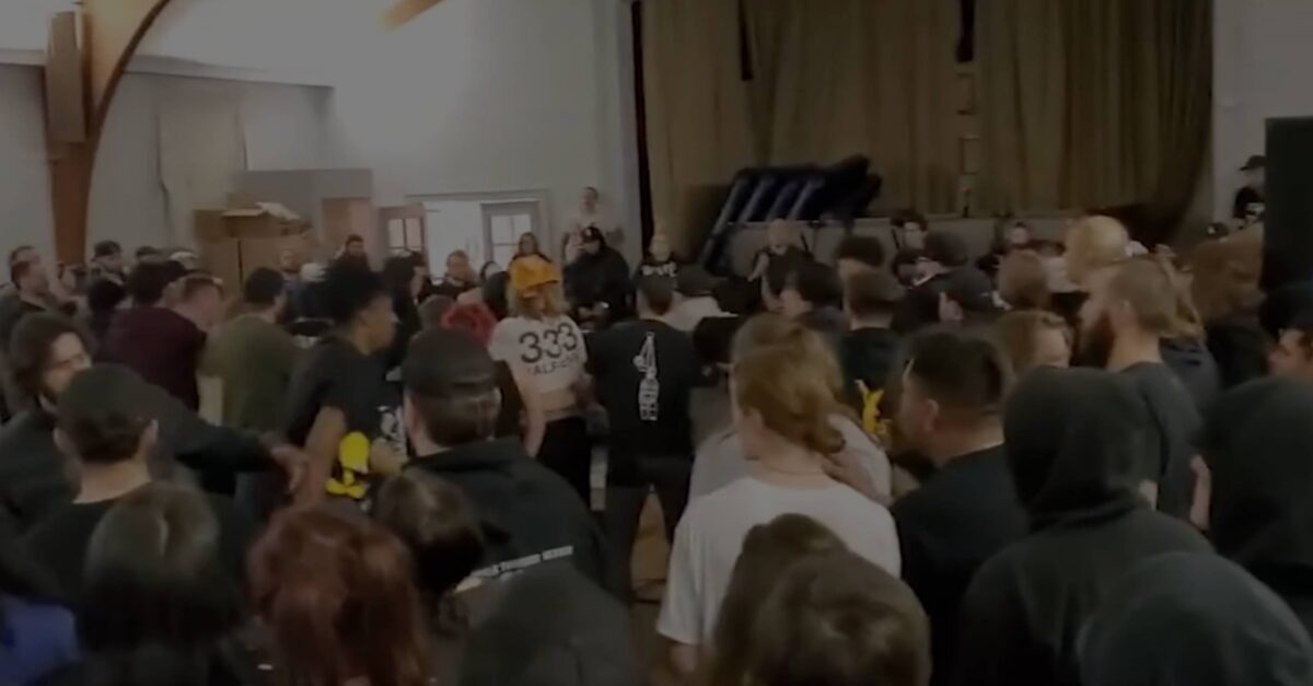 A man shouted, "White Lives Matter!" at a crowd was arrested in an attack at a social justice concert at a church in New Jersey in January 2023. (Screenshot from ABC7NY)