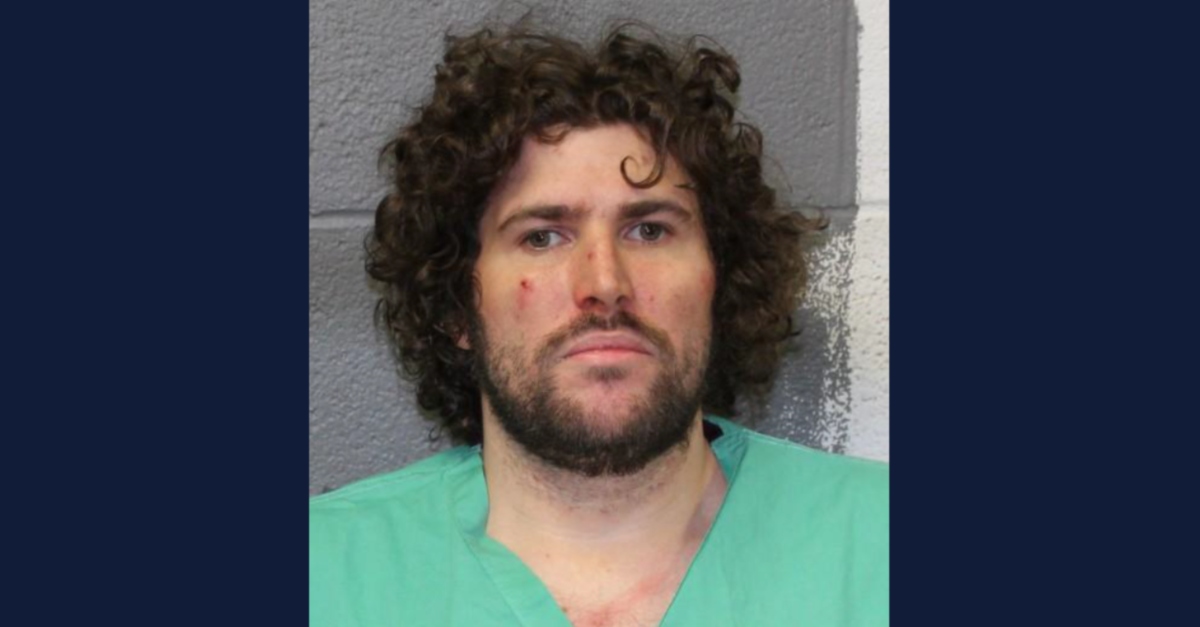 Darel A. Galorenzo was driving an SUV when he crashed, police said. He then lost his son in a brook while fleeing the scene, they said. (Mugshot: Massachusetts State Police)