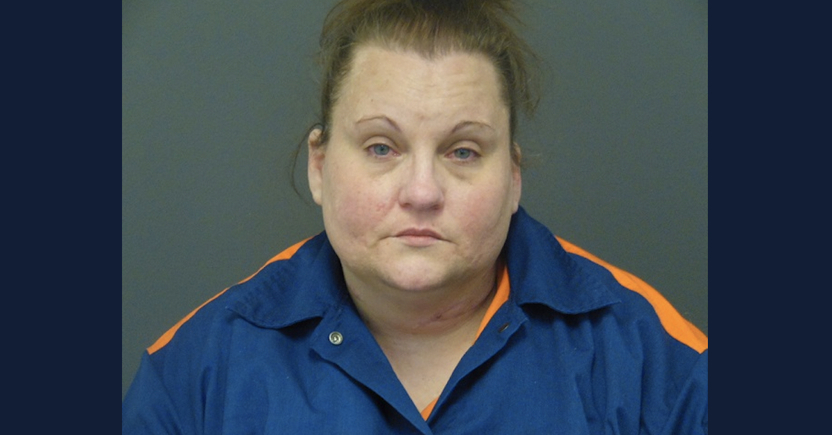 Jennifer Ann Monroe appears in a mugshot