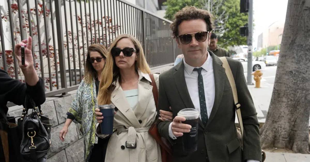 Danny Masterson, right, and his wife Bijou Phillips arrive for closing arguments in his second trial, May 16, 2023, in Los Angeles. A jury found “That ’70s Show” star Masterson guilty of two counts of rape Wednesday, May 31, in a Los Angeles retrial in which the Church of Scientology played a central role. (AP Photo/Chris Pizzello, File)