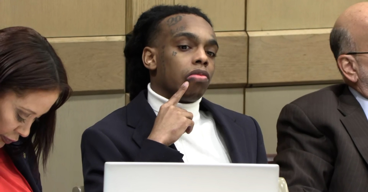 YNW Melly ponders something in court