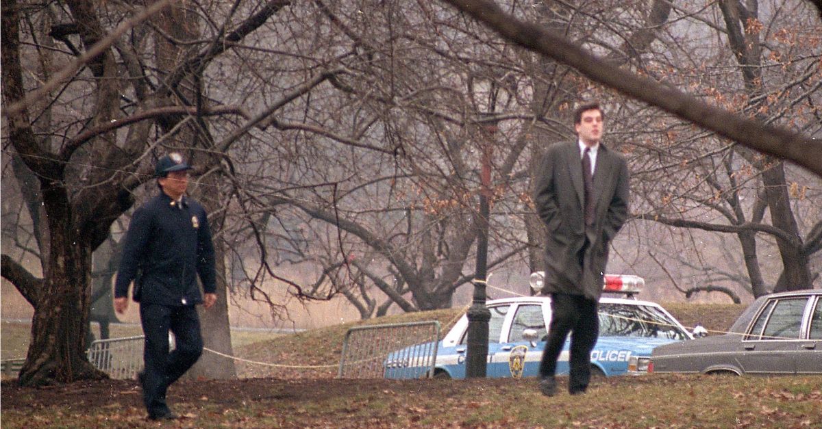 Robert Chambers, right, approaches the site where 18-year-old Jennifer Levin's body was found in Central Park, New York City, March 4, 1988. Chambers, charged with second-degree murder in Levin's death in 1986, quickly returned to his car where he stayed while the jury examined the scene. 