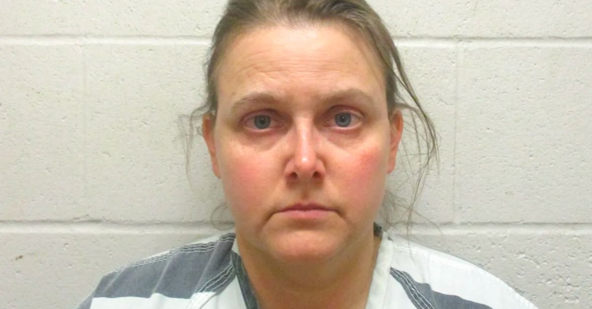 Amanda Moffett appears in a booking photo.