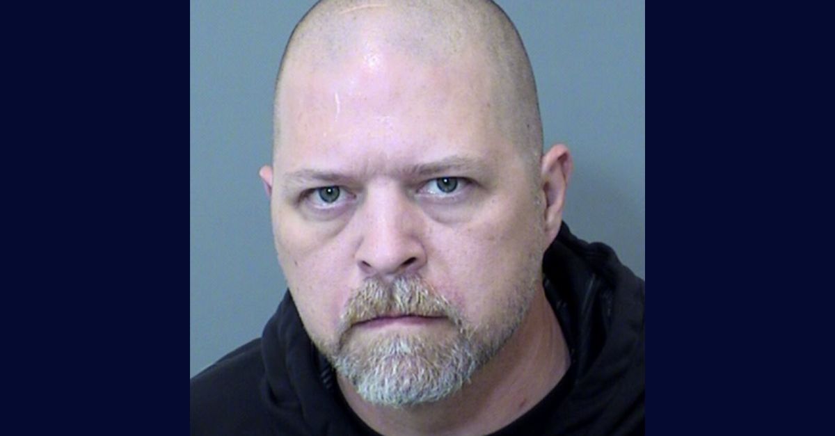 Randall Bird appears in a booking photo