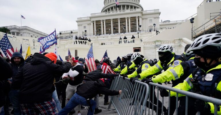 FILE - In this Jan. 6, 2021, file photo, Trump supporters try to break through a police barrier at the Capitol in Washington. For America's allies and rivals alike, the chaos unfolding during Donald Trump's final days as president is the logical result of four years of global instability brought on by the man who promised to change the way the world viewed the United States. (AP Photo/Julio Cortez, File)