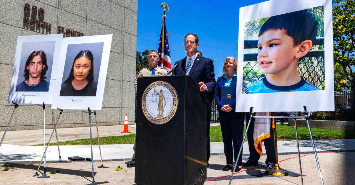 FILE - In this June 8, 2021 file photo Orange County District Attorney Todd Spitzer announces, in Santa Ana, Calif., charges filed against suspects Marcus Eriz and Wynne Lee in the death of Aiden Leos, right, the 6-year-old boy who was shot and killed on his way to kindergarten in his mother's car. Prosecutors say they want a Eriz, held without bail after charging him with the murder of Aiden Leos in a road rage incident. Orange County prosecutors wrote in court papers this week that Eriz told police he grabbed a gun, rolled down the window and shot at a car driven by a woman who made a rude gesture toward him on the freeway on May 21. (Mark Rightmire/The Orange County Register via AP)