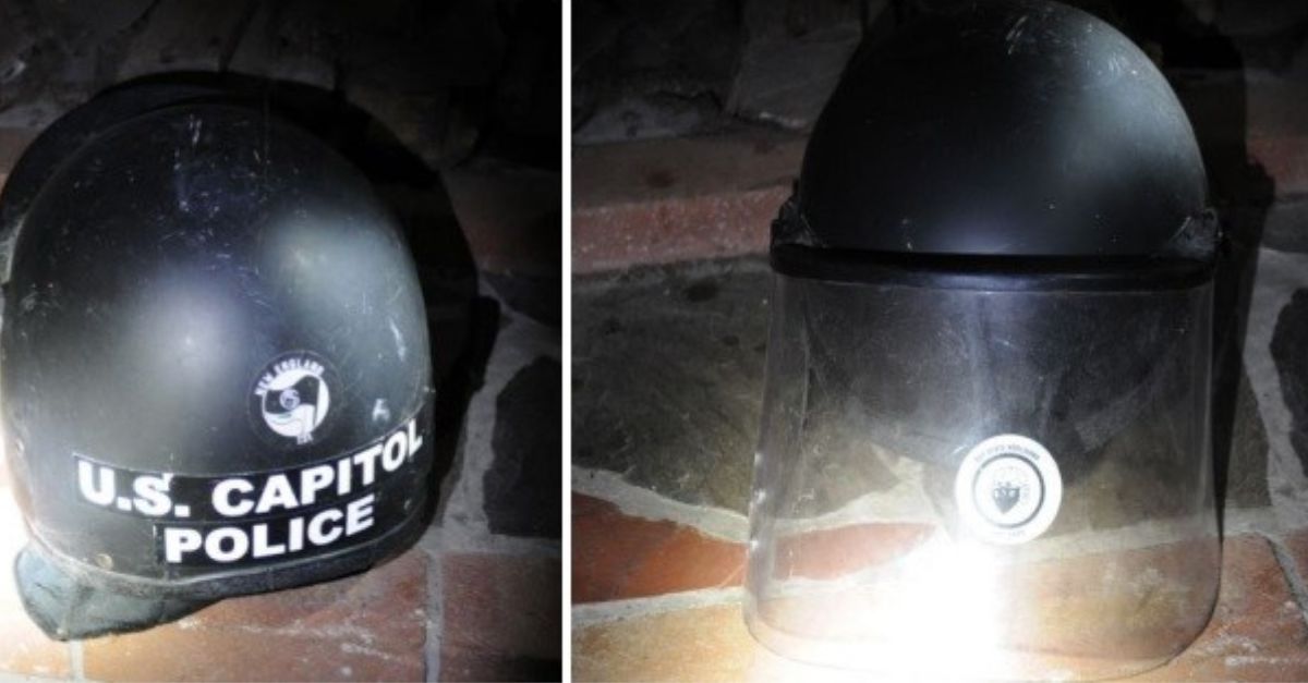Justice Department provided photos of the front and back of the U.S. Capitol Police officer helmet recovered from Richard Ackerman’s bedroom. 