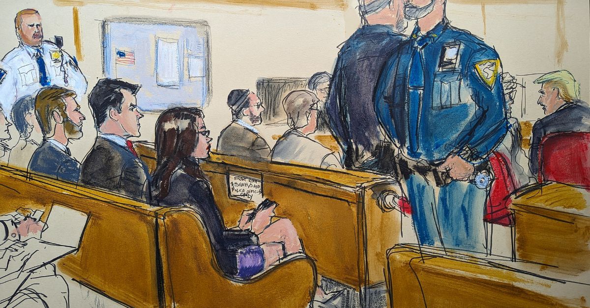 Rep. Matt Gaetz, R-Fla., second from left, and Rep. Lauren Boebert, R-Colo., third from left, watch proceedings in Donald Trump's, far right, hush money trial at Manhattan criminal court, Thursday, May 16, 2024, in New York. (Elizabeth Williams via AP)