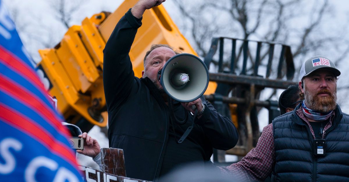 Alex Jones speaks on the East Front of the U.S. Capitol Wednesday, Jan. 6, 2021, in Washington, as rioters breach the Capitol. (AP Photo/Jose Luis Magana)