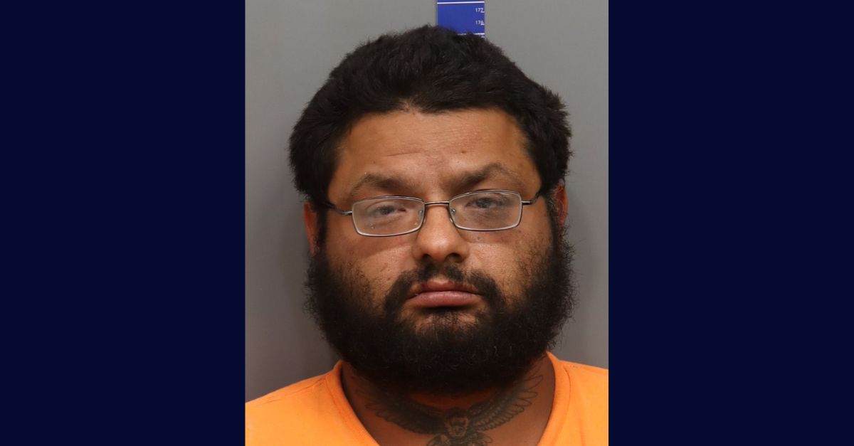 Timothy Blackdeer appears in a booking photo.