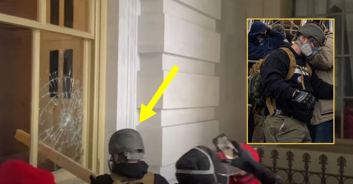 Edward Kelley appears to break a window at the U.S. Capitol in a gas mask, clear glasses, black and grey gloves, and a green tactical helmet during the insurrection on Jan. 6, 2021 (U.S. Attorney