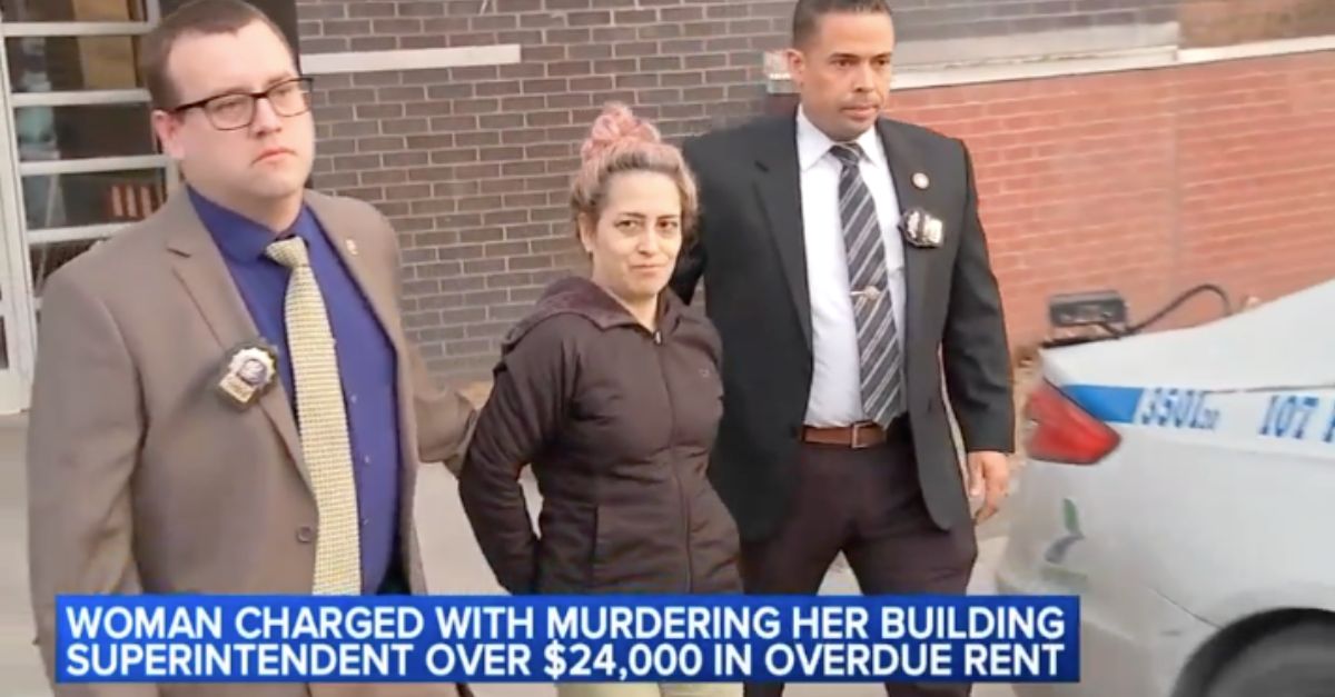 Sandra Coto Navarro is escorted by police after being arrested for murder, Jan. 16, 2024 (WABC).