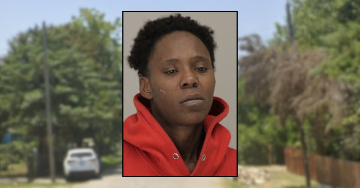 Woman arrested following house fire