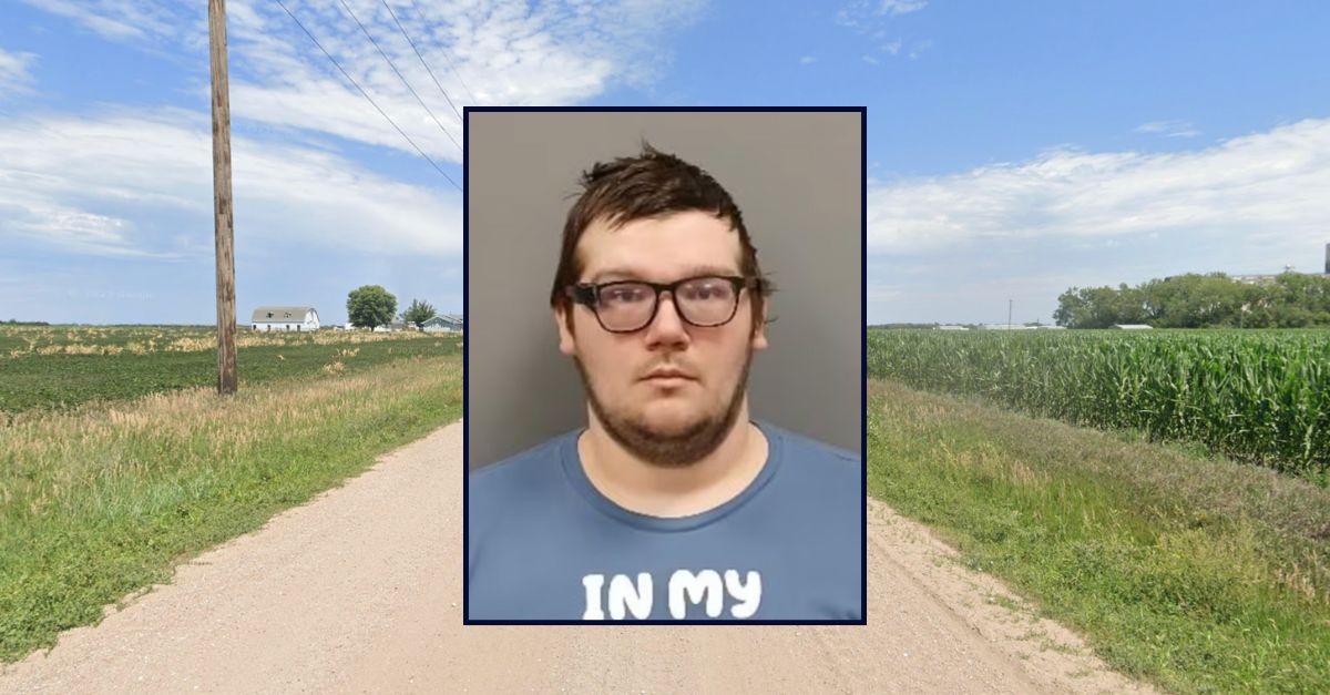 Austin Hendrick appears in a booking photo inset against an image of a rural road in Nebraska.