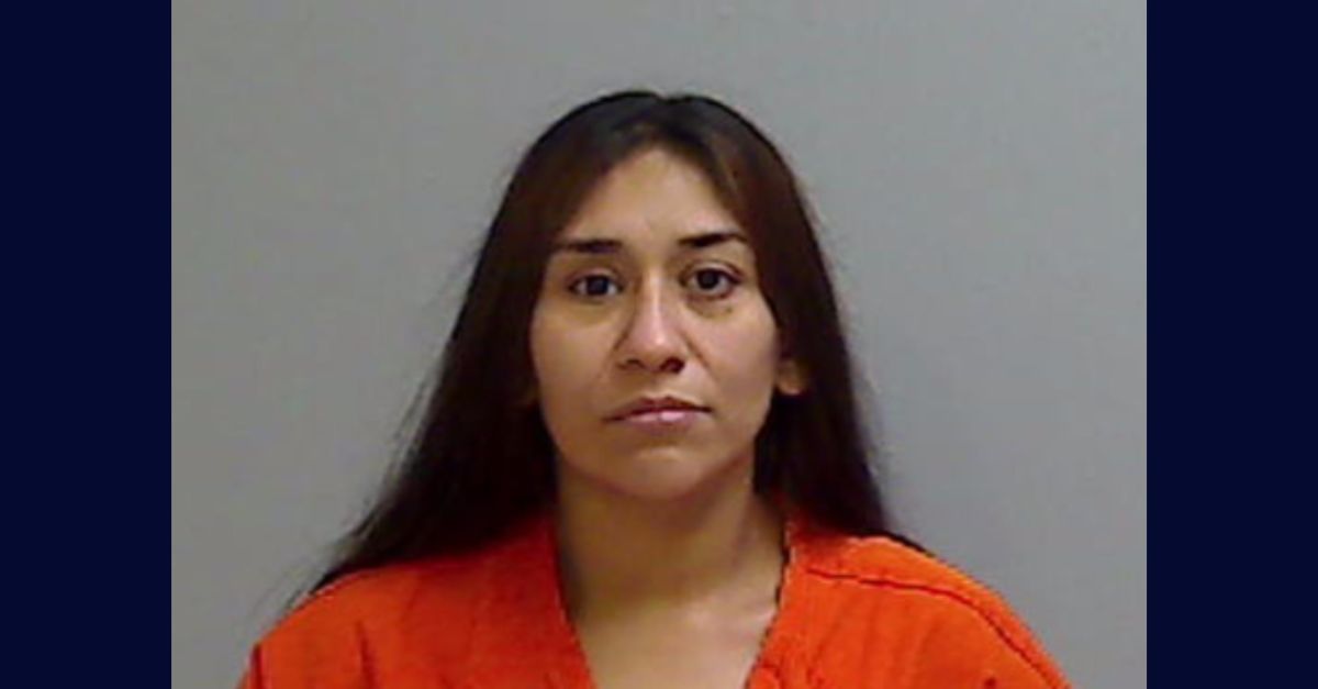 Karina Ramirez appears in a booking photo.